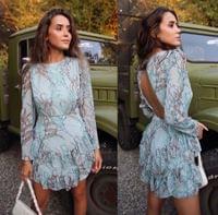 Къса рокля цвят мента с гол гръб и цветни мотиви - 2
